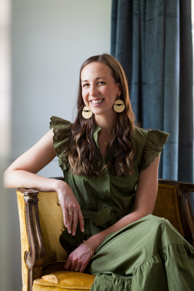 Headshot of Riley Moody of Good Mood Design Co in her office in Charlotte NC